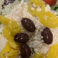 Greek Salad · Served with your choice of dressing.