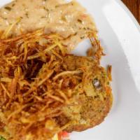 Crab Cakes * · Pan seared lump crab cakes served with roasted corn pico de gallo, caper remoulade and crisp...