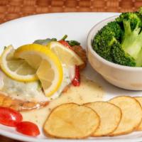 Lemonade Cutlet · Freshly breaded chicken cutlet with garlic lemon sauce topped off with spinach, roasted pepp...