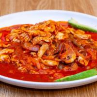 Arroz Con Pollo · Delicious marinated chicken, sauteed with peppers, onions, and mushrooms over rice with melt...