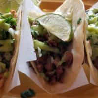 Street Tacos · Three soft corn tortillas filled with chopped grilled steak, chicken, shrimp or tender pork ...