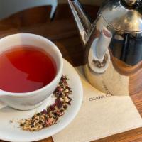 Hibiscus · Caffeine free loose leaf hibiscus herb tea.  Tasting notes of cherry, cranberry and raspberr...
