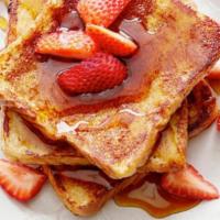 Texas French Toast · Two slices of thick toast dipped in batted and grilled.