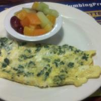 Spinach & Feta Cheese Omelette Breakfast · Served with home fries or grits, toast and jelly.
