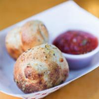 Garlic Knots · Fresh dough, hand-tied & perfect for dipping. Served with fuel marinara.