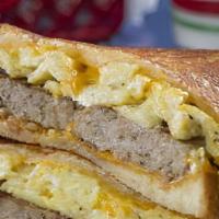 Sausage & Egg Sandwich · A sausage patty and two scrambled eggs on your choice of bread.