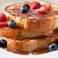French Toast For Vegetarian · Comes with three French toast, two eggs any style and choice of home fries or grits.