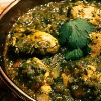 Chicken Saag · Tender pieces of chicken sauteed with indian herbs, cooked in spinch.