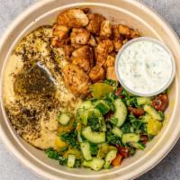 Souvlaki Chicken Bowl · Souvlaki marinated chicken breast, cucumber & tomato salad, hummus, tzatziki, and a side of ...