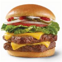 Dave'S Double® · A half-pound* of fresh beef, American cheese, crisp lettuce, tomato, pickle, ketchup, mayo, ...