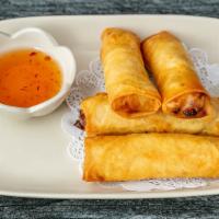 Thai Roll (Vegetable) · Meatless crispy rolls stuffed with mixed veggies. Served with sweet & sour sauce.