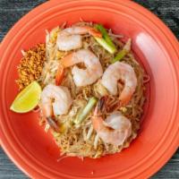 Pad Thai · Traditional Thai dish, stir-fried noodles with chicken and shrimp, egg, bean sprouts, scalli...