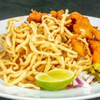 Crispy Chicken Pad Thai · Stir-fried rice noodles with egg, basil, bean sprouts, crushed peanut and scallion topped wi...
