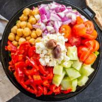 Greek With Twist Salad · Chopped romaine,feta, onions,cucumbers,tomatoes,roasted peppers,chickpeas olives,greek dress...