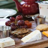 Cheese Board · three english style selections, savory biscuits, quince paste, grape chutney, clover honey