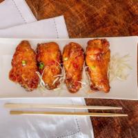 Thai Chicken Wing · Fried marinade chicken wing with honey sweet chili sauce.