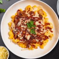 Get Sauced Bbq Chicken Mac · Caramelized onions, bbq cheese sauce, and roasted chicken cooked in a blend of creamy cheese.