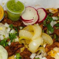 Al Pastor Paisa Tacos · 3 pieces. Marinated pork with pineapple, corn tortilla, radish, cucumbers, chopped onions, c...
