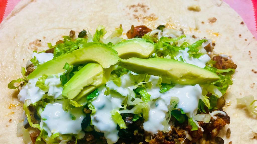 Asada Burrito (Grilled Steak) · Favorite. Lettuce, pico de gallo, cheese, rice, black beans, avocado and sour cream.