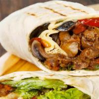 Tinga Burrito · Marinated chicken, lettuce, pico de gallo, cheese, rice, black beans, avocado and sour cream.