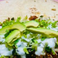 Chicken Burrito · Lettuce, pico de gallo, cheese, rice, black beans, avocado and sour cream.