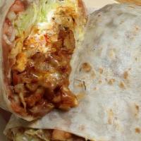 Al Pastor Burrito · Marinated pork with pineapple, lettuce, pico de gallo, cheese, rice, black beans, avocado an...