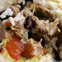 Carnitas Burrito · Roast pork, lettuce, pico de gallo, cheese, rice, black beans, avocado and sour cream.