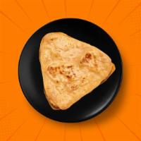 Classic Punjabi Paratha  · A whole wheat layered flatbread baked on a pan and drizzled with butter. A perfect accompani...
