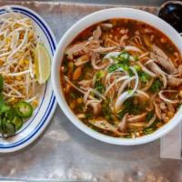 Phở With Chicken · Every bowl of Phở comes with gluten free rice noodles, onion, cilantro, scallion in a homema...