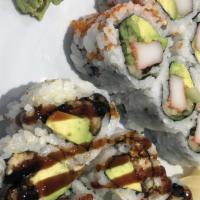 California Maki · Raw. Crabmeat, avocado, cucumber wrap with seaweed and garnished with tobiko.
