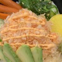 Spicy Don · Raw. Mixed spicy tuna, salmon, yellowtail or crabmeat on top of a bowl of rice.