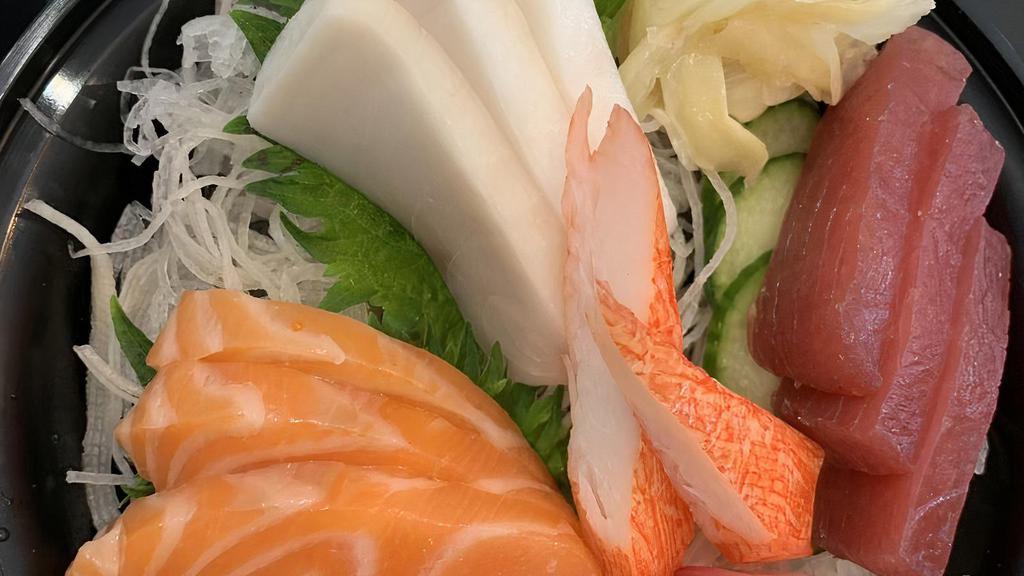 Sashimi Deluxe · Raw. Twelve pieces of sashimi under chef choices.