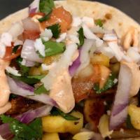 Surf And Turf Tacos · shrimp beef coleslaw cheese pineapple salsa chipotle cream  with rice and beans