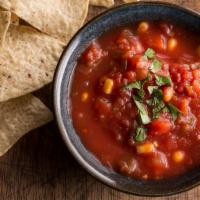 Salsa & Chips · Tomato, onion, cilantro, jalapenos, served with fresh tortilla chips.
