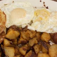 Housemade Corned Beef Hash · Made with peppers and onions.