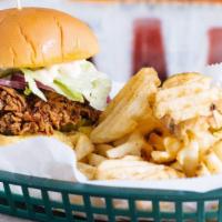 Fried Chicken Sandwich · Crispy chicken breast with spicy pickles, red onion, iceberg lettuce and habanero mayo on a ...