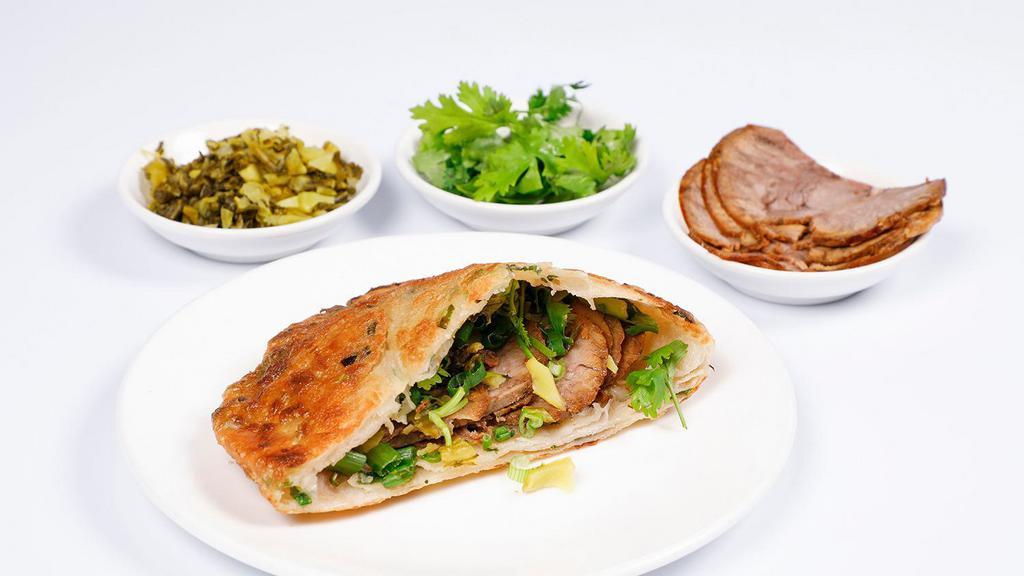 Beef Pancake · Cold Dish: Crispy pancake w. COLD marinated beef, Chinese style sour mustard and Cilantro