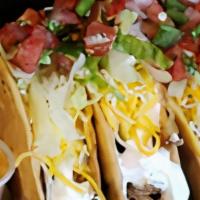 Crispy Taco · 3 crispy corn tacos served with lettuce, cheese, pico de gallo and sour cream. Please choose...