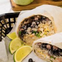 El Burrito · Wrapped with a larger flour tortilla with black beans, cilantro rice (contains chicken stock...