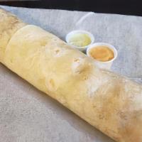 El Macho Burrito · Two burritos in one! Served with black beans, cilantro rice, sour cream and pico de gallo. P...