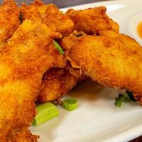 Fried Chicken Wings · Seven original fried chicken wings served with spicy sweet sauce.