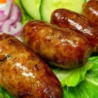 Issan Sausages · Traditional Thai sausage made with pork.