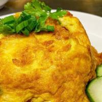 Khao Kai Jeaw · Thal style omelet mixed with ground chicken and scallion over rice, served with sweet chili ...