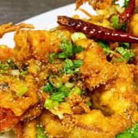Salt & Pepper · Hot. Thai famous crab or calamari dry stir-fried seasoning with salt, pepper, garlic, scalli...