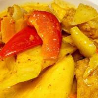 Mango Curry · Hot. Your choice of meat, Mango yellow curry sauce, onions, carrots, peppers and cashew