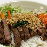 Grilled Angus Steak With Vermicelli · Served with peanut, scallion oil, lettuces, bean sprouts, and carrot/daikon pickles.