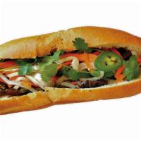 Grilled Pork Sandwich · Combination of grilled sliced pork serve with mayo, vietnamese pickles, cilantro, jalapeno, ...