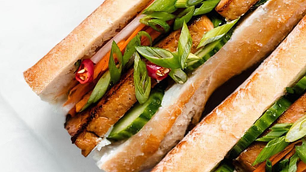 Tofu Sandwich · Combination of fried tofu serve with  vietnamese pickles, cilantro, jalapeno, cucumber, soy sauce