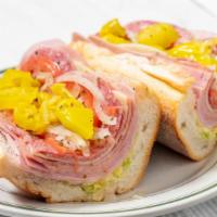 Italian Hoagie · Genoa salami, capicola, ham , and provolone cheese served  on a long roll.  Includes our 