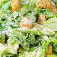 Caesar Salad · Romaine lettuce topped with Parmesan cheese and croutons. Dressing served on the side.